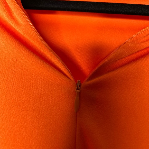 Sexy and alluring bright orange bodysuit, with a zipper! - Picture 2 of 3